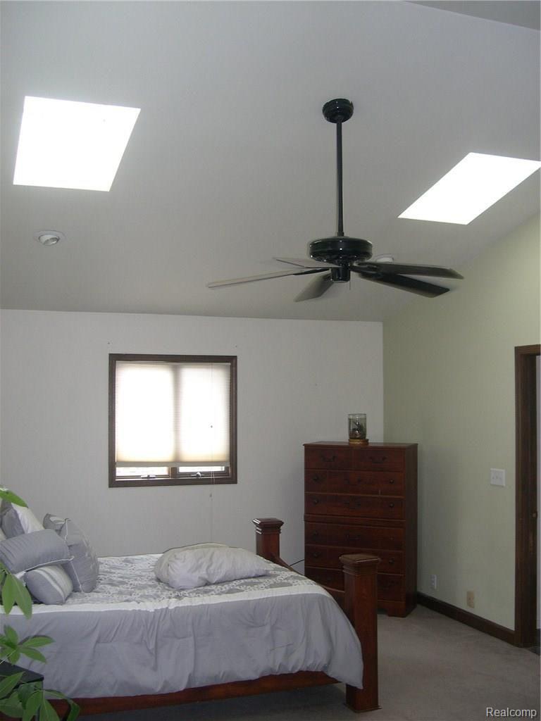 10219 Farmington Road Livonia, MI 48150 - Photo 28 of 34 SKYLIGHTS AND CATHEDRAL CEILINGS IN MASTER BEDROOM