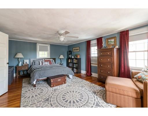 37 Bluff Road Weymouth, MA 02191 - Photo 14 of 21 a living room with furniture a chandelier and a window