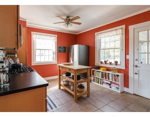 37 Bluff Road Weymouth, MA 02191 - Photo 7 of 21 a room with furniture a flat screen tv and a window
