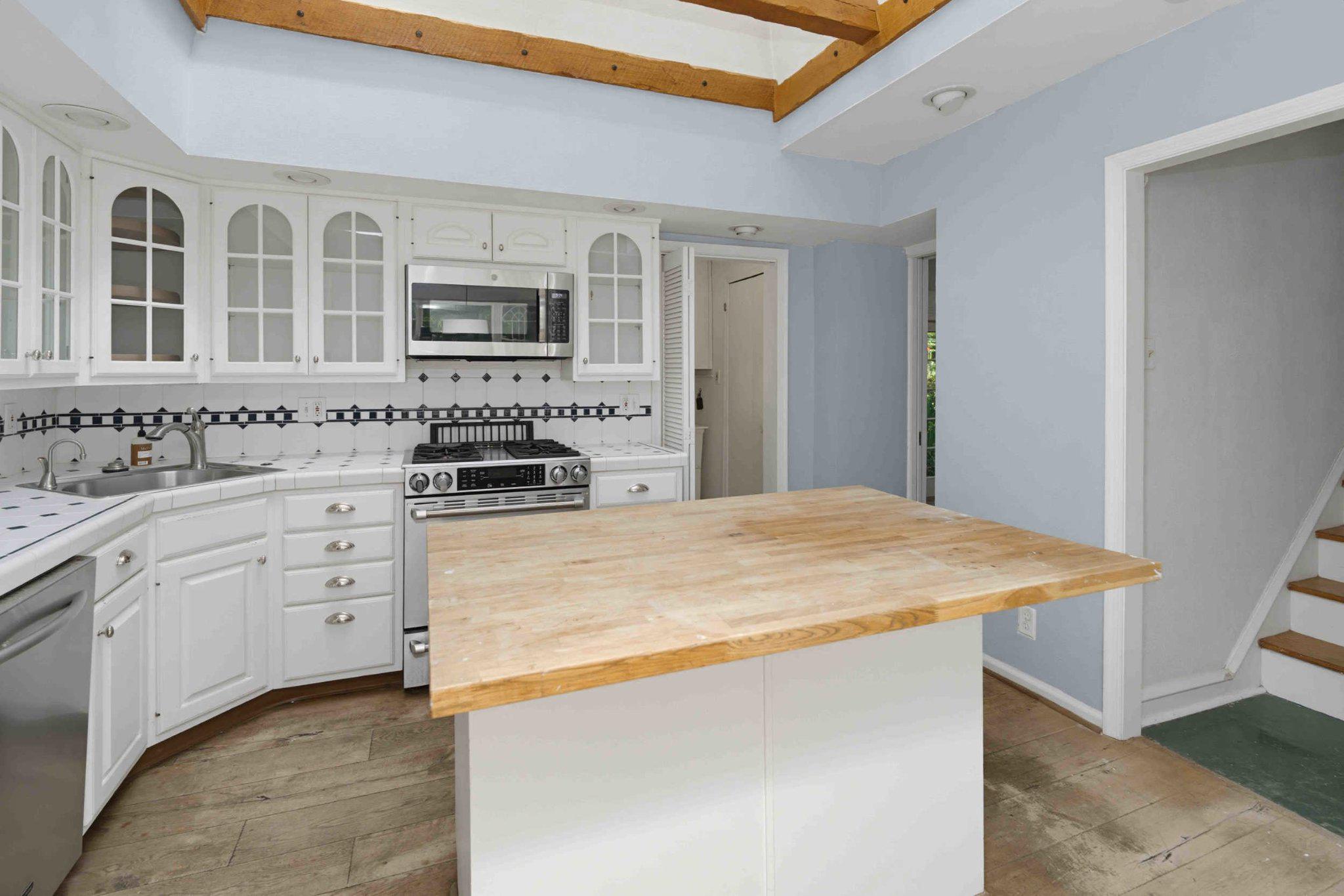 1268 Rydal Road Jenkintown, PA 19046 - Photo 12 of 31 a spacious bathroom with a granite countertop sink and a mirror
