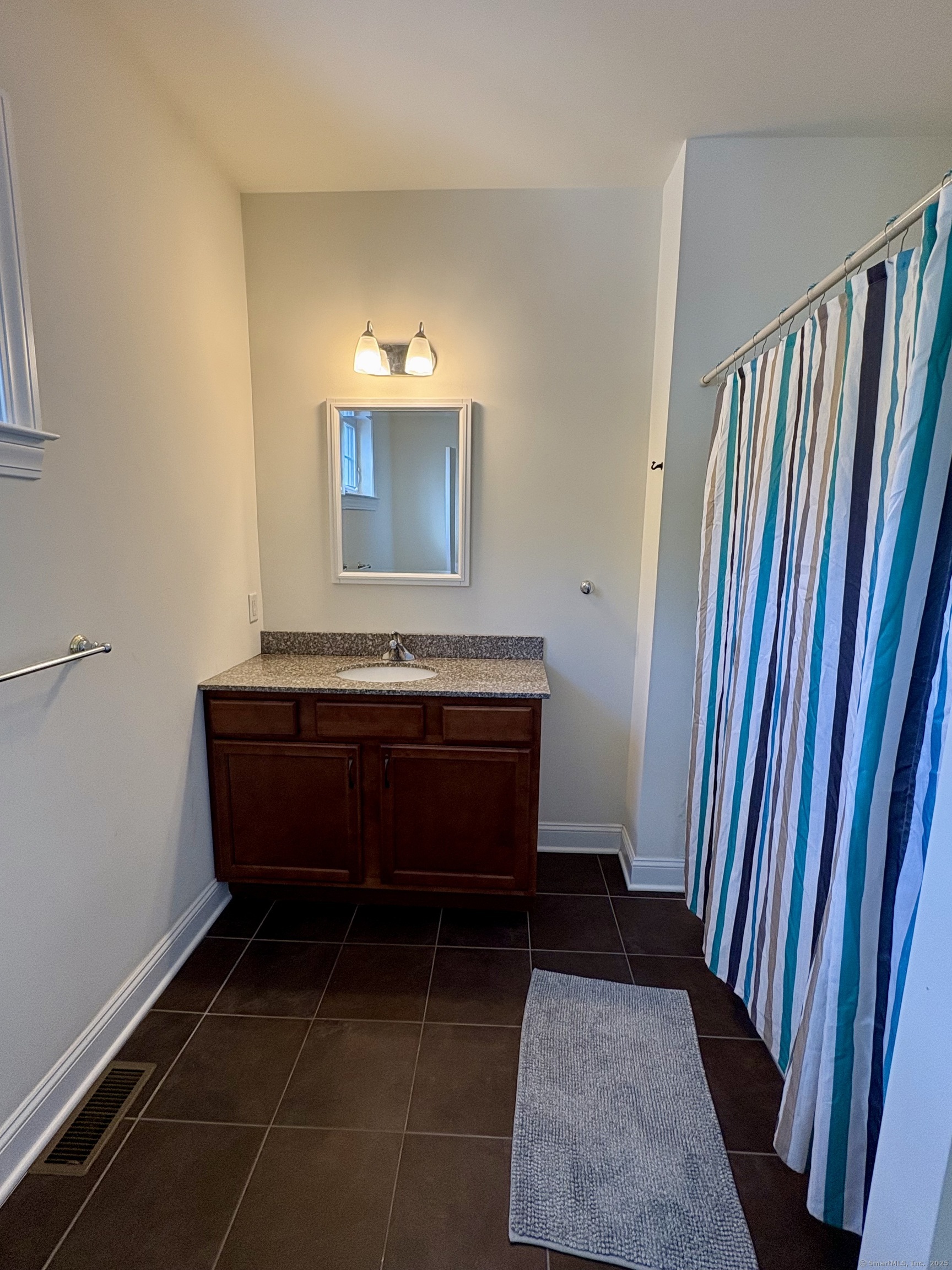 47 Sherwood Street, Unit 47 Mansfield, CT 06268 - Photo 16 of 21 a room with musical instruments