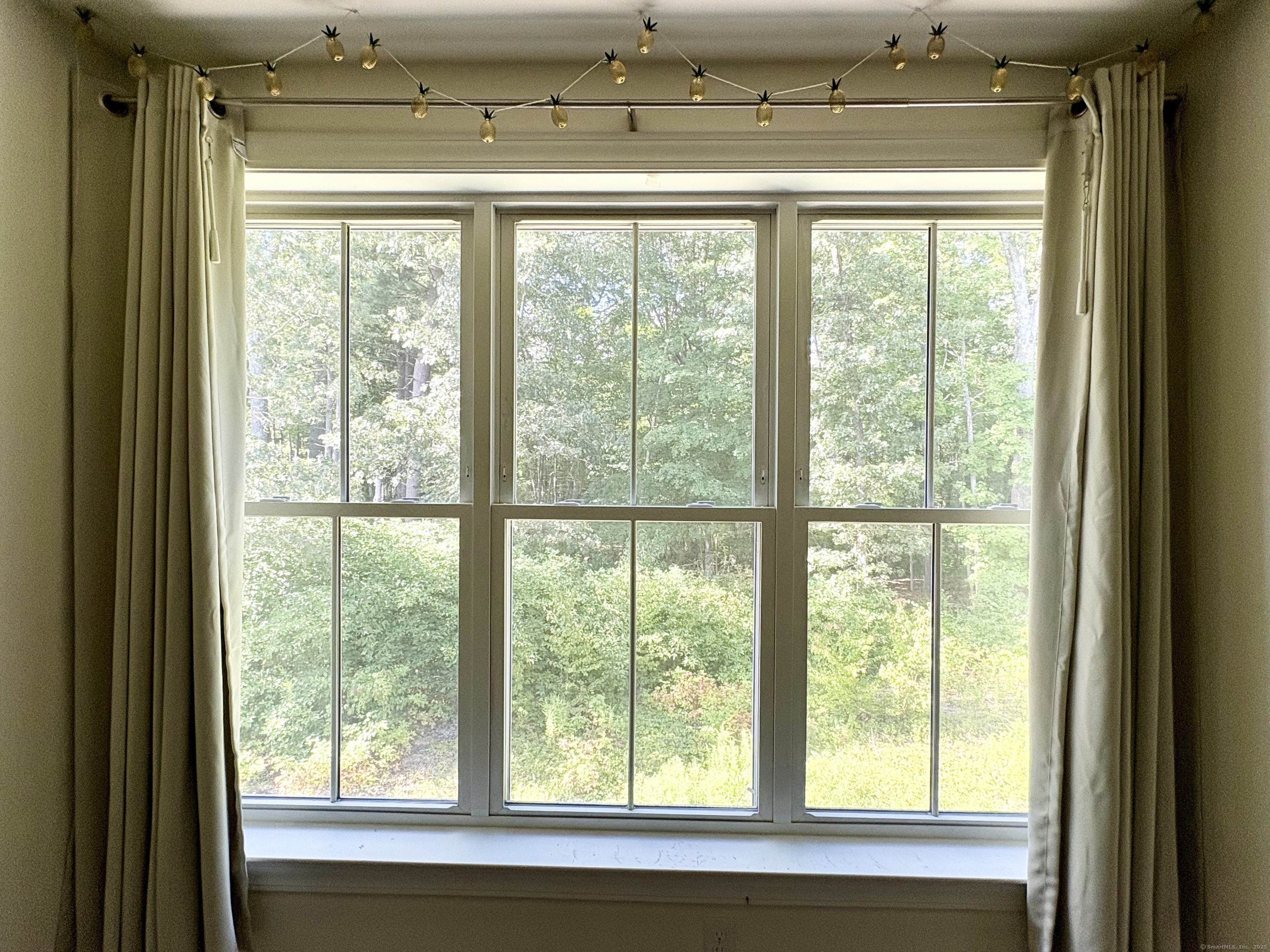 47 Sherwood Street, Unit 47 Mansfield, CT 06268 - Photo 18 of 21 a view of a living room with a large window