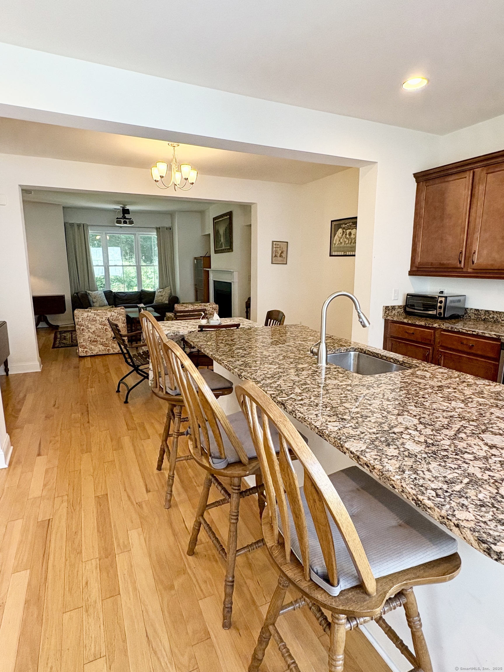47 Sherwood Street, Unit 47 Mansfield, CT 06268 - Photo 6 of 21 a view of a living room and kitchen counter space