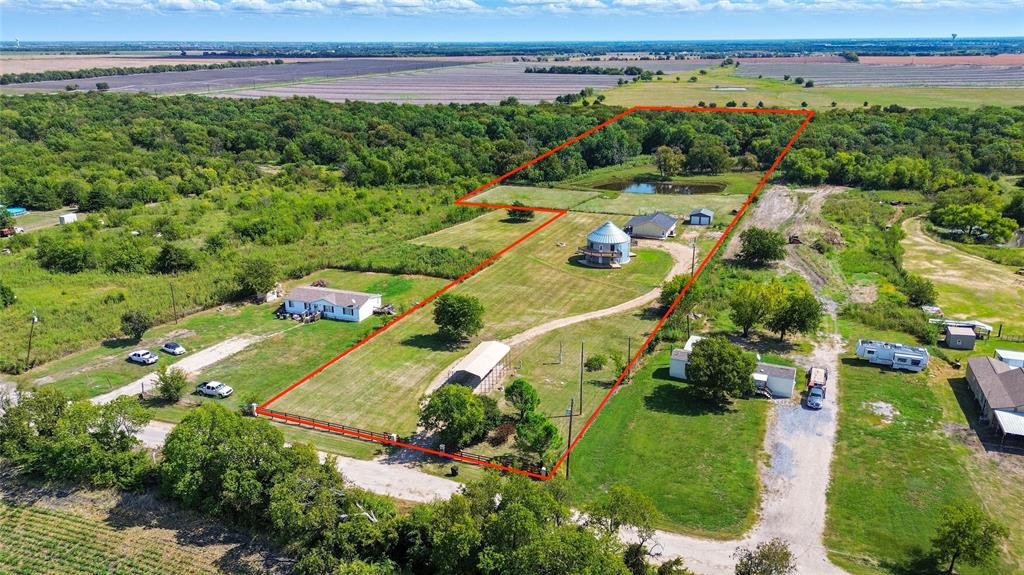 9833 Private Rd. 5377 Nevada, TX 75173 - Photo 1 of 40 an aerial view of a houses with a yard