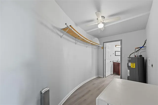 a view of a hallway with a chandelier