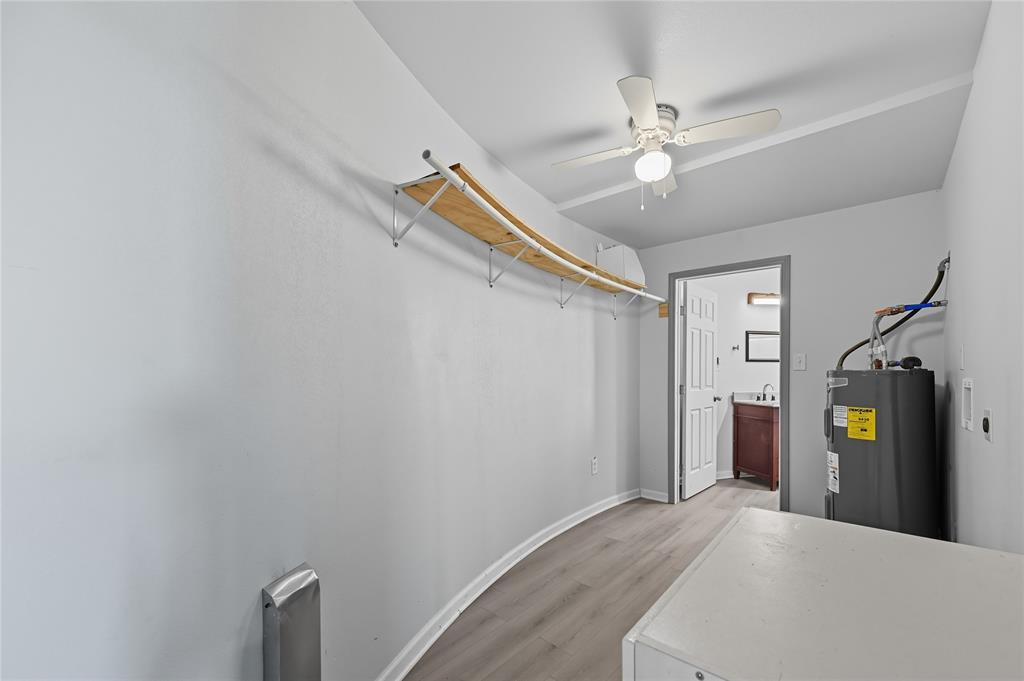 9833 Private Rd. 5377 Nevada, TX 75173 - Photo 11 of 40 a view of a hallway with a chandelier