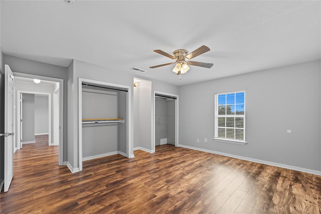 9833 Private Rd. 5377 Nevada, TX 75173 - Photo 38 of 40 a view of a livingroom with wooden floor and a window