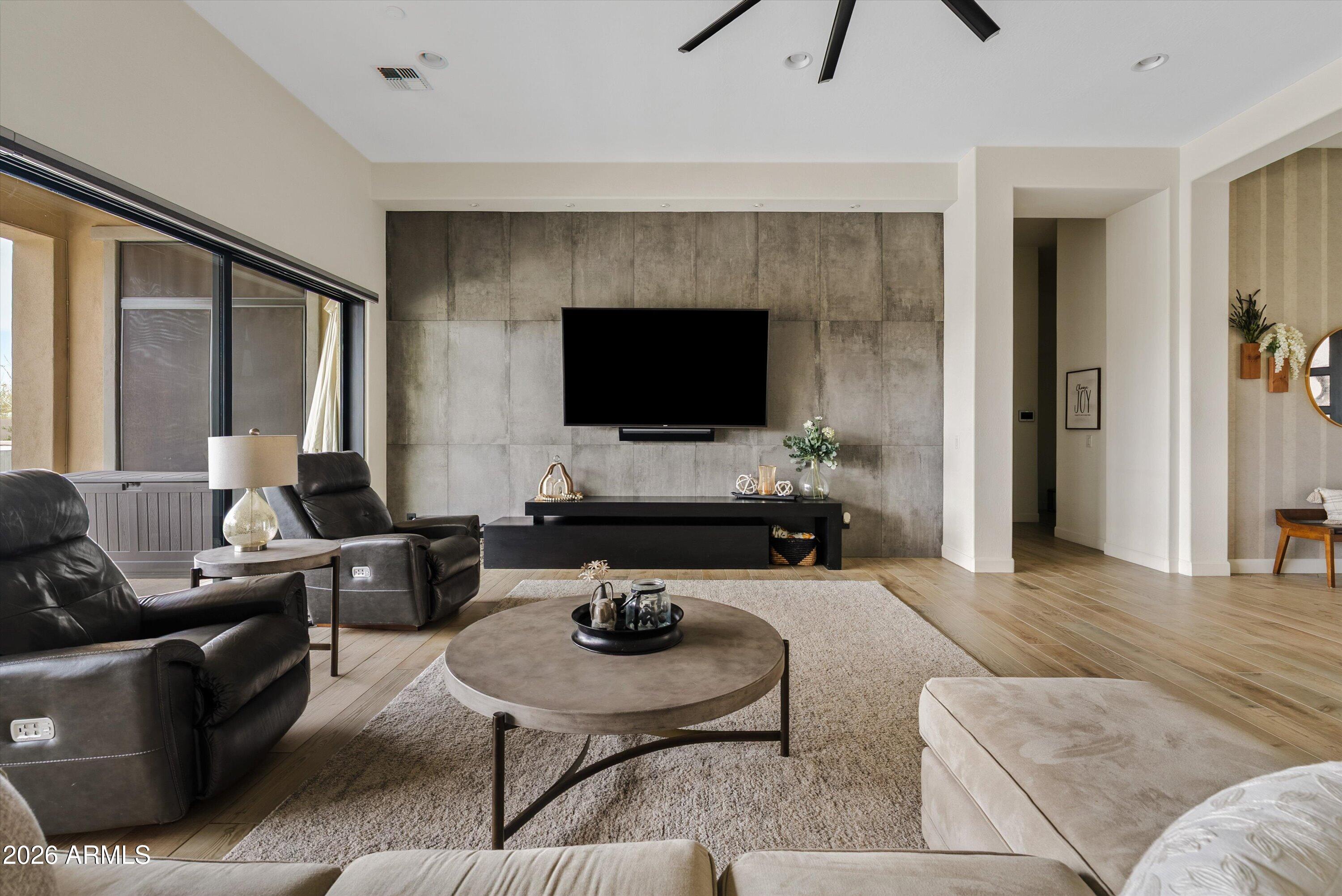 7002 South Portland Avenue Gilbert, AZ 85298 - Photo 16 of 40 a living room with furniture and a flat screen tv