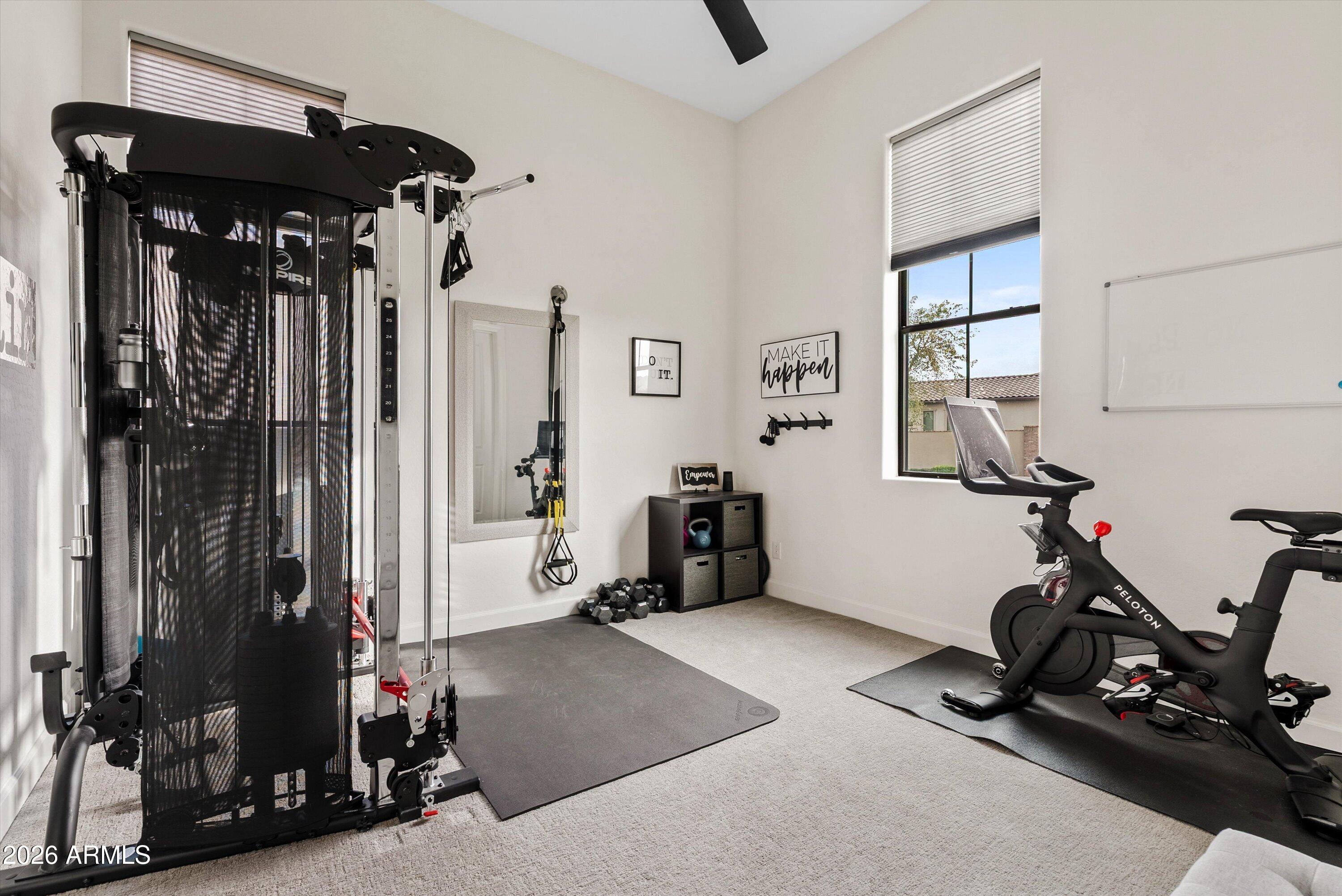 7002 South Portland Avenue Gilbert, AZ 85298 - Photo 27 of 40 a view of a room with gym equipment
