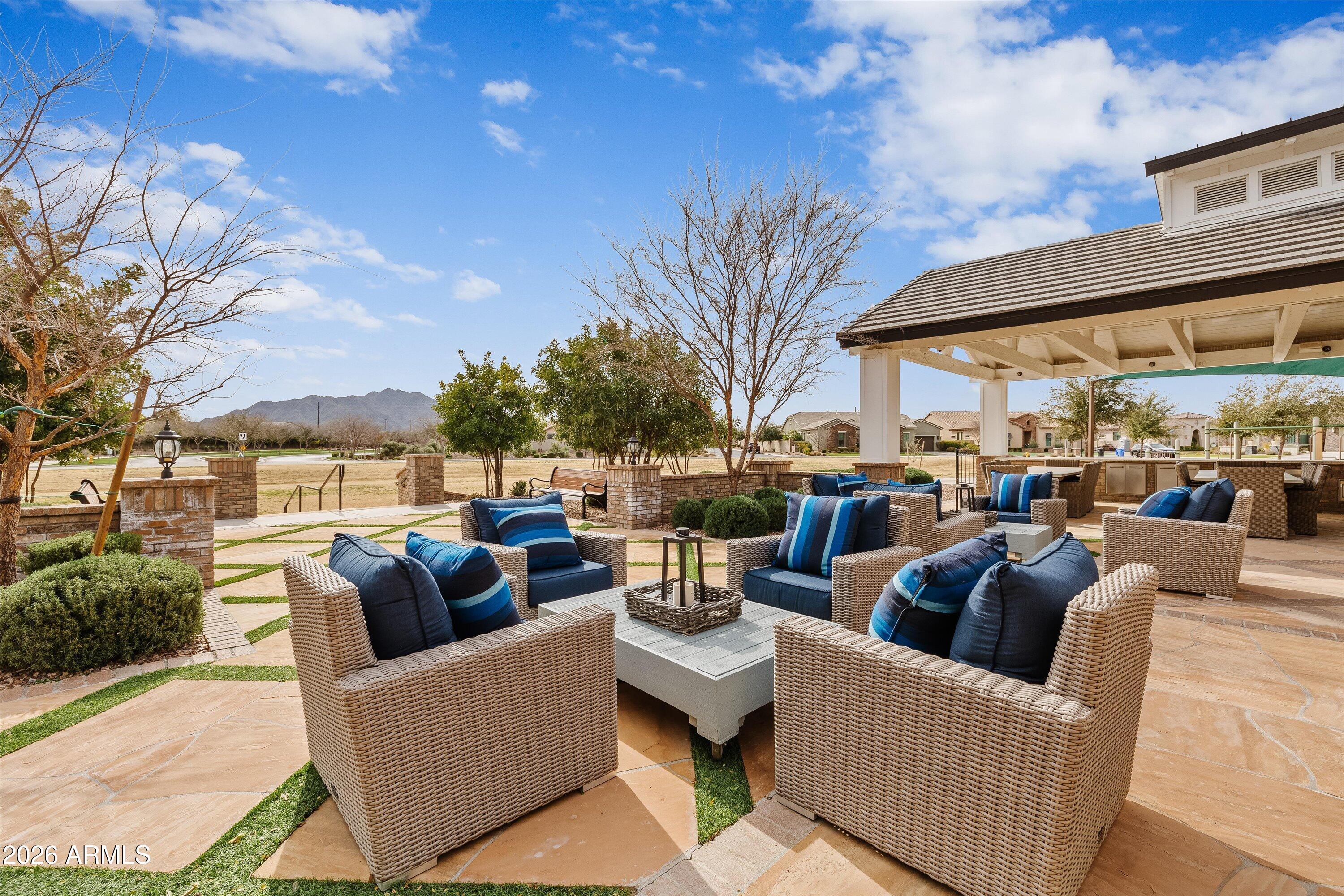 7002 South Portland Avenue Gilbert, AZ 85298 - Photo 6 of 40 a outdoor living space with patio furniture and a potted plants
