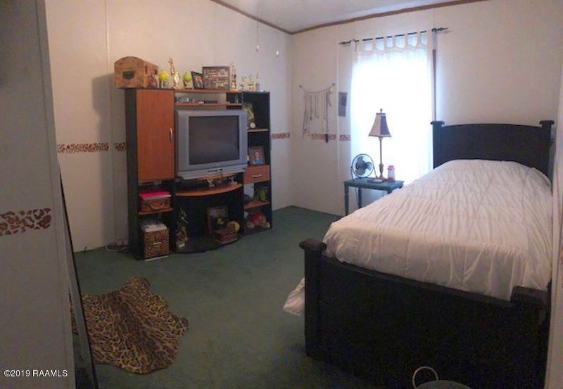 11323 Wesley Road Abbeville, LA 70510 - Photo 8 of 13 Guest bedroom