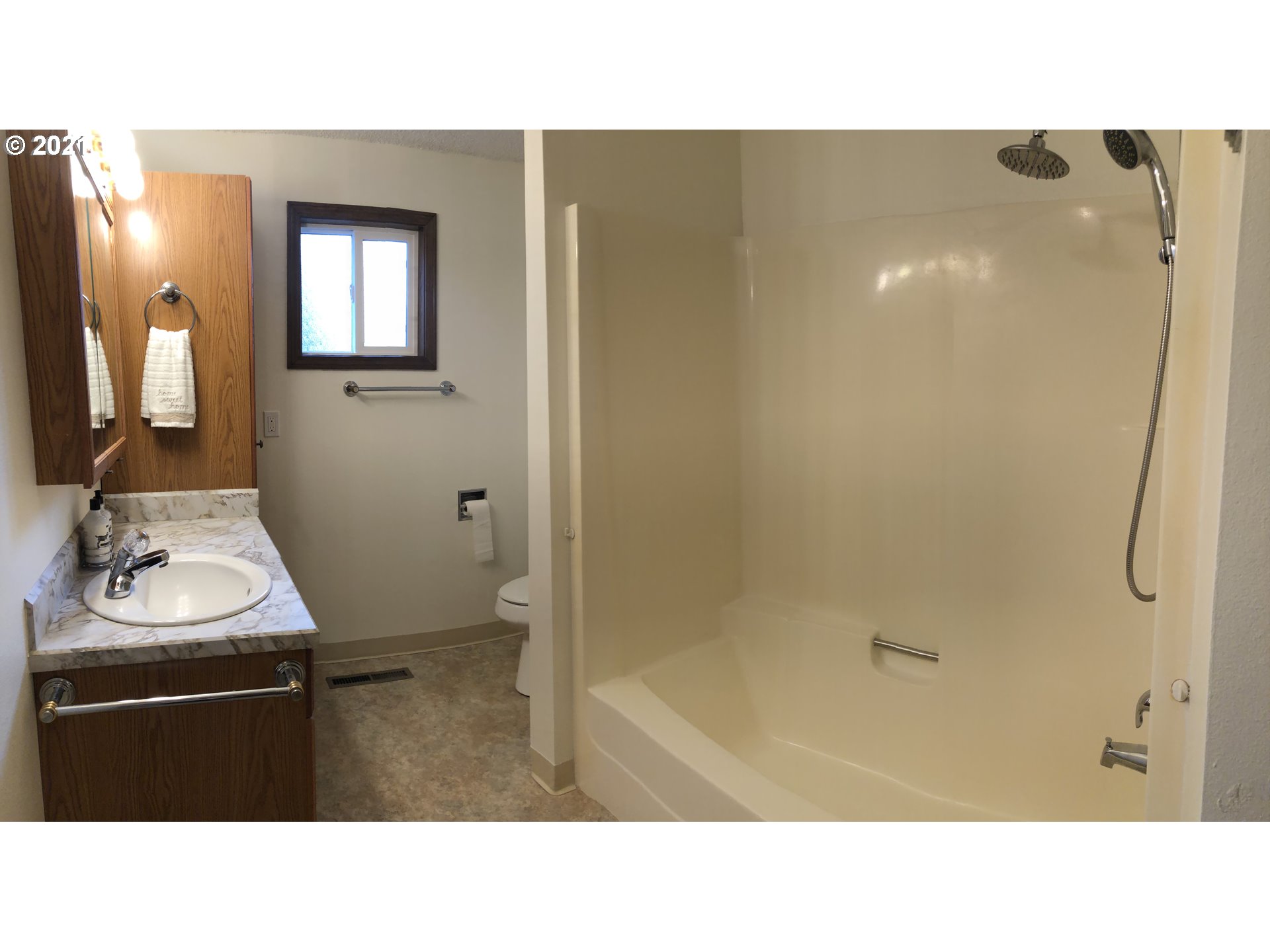 4520 Southwest Olson Avenue Pendleton, OR 97801 - Photo 11 of 22 a bathroom with a sink and a mirror