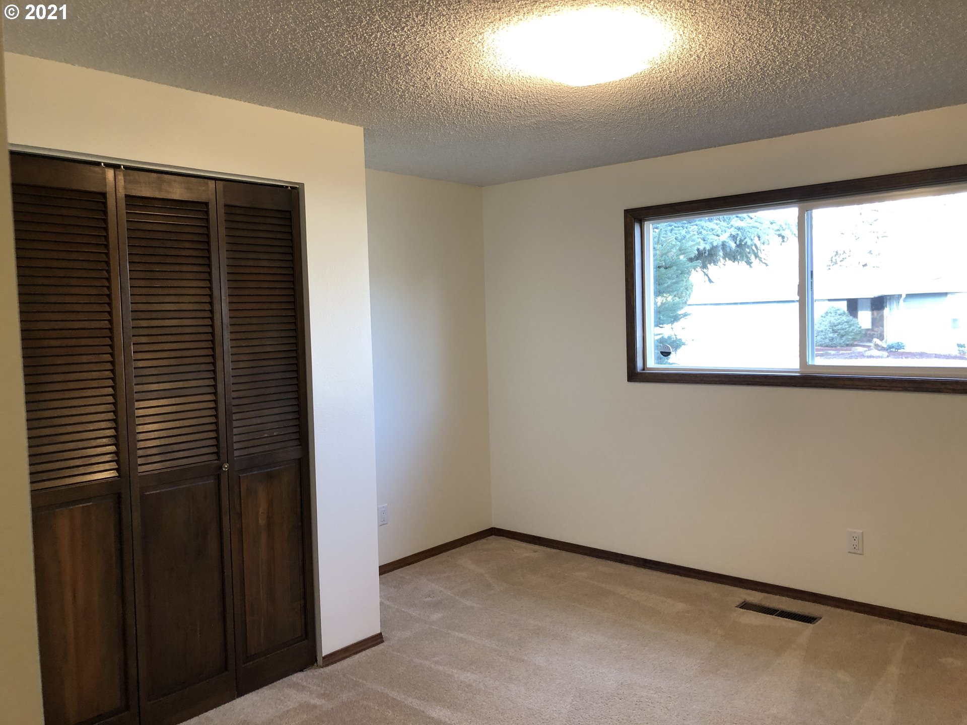 4520 Southwest Olson Avenue Pendleton, OR 97801 - Photo 17 of 22 a view of a room that has a window in it