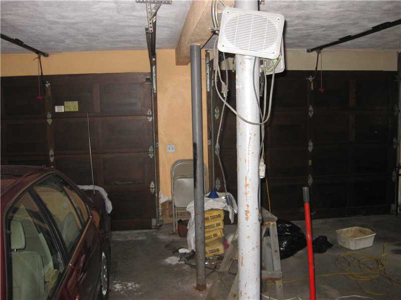 9 Walker Road Foster, RI 02825 - Photo 22 of 25 Parking Lot/Garage. 2 Car Garage- Power Door Openers no longer operating but garage doors function manually.
