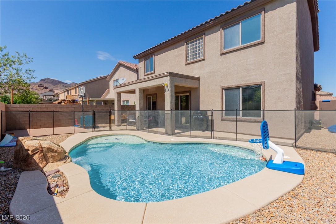113 Lovage Street Henderson, NV 89002 - Photo 27 of 27 View of swimming pool with a patio area