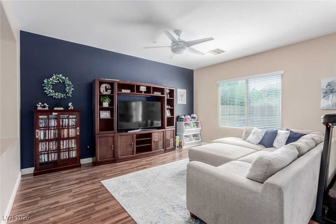 113 Lovage Street Henderson, NV 89002 - Photo 5 of 27 Living area with wood finished floors and ceiling fan