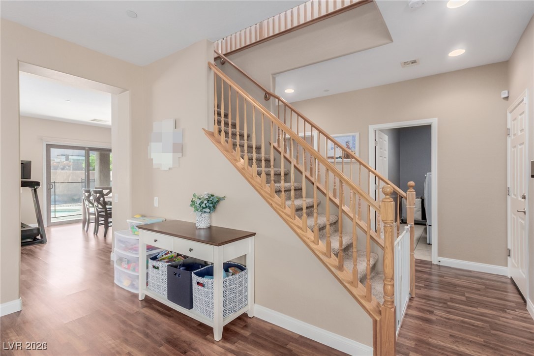 113 Lovage Street Henderson, NV 89002 - Photo 9 of 27 Stairs with wood finished floors and baseboards