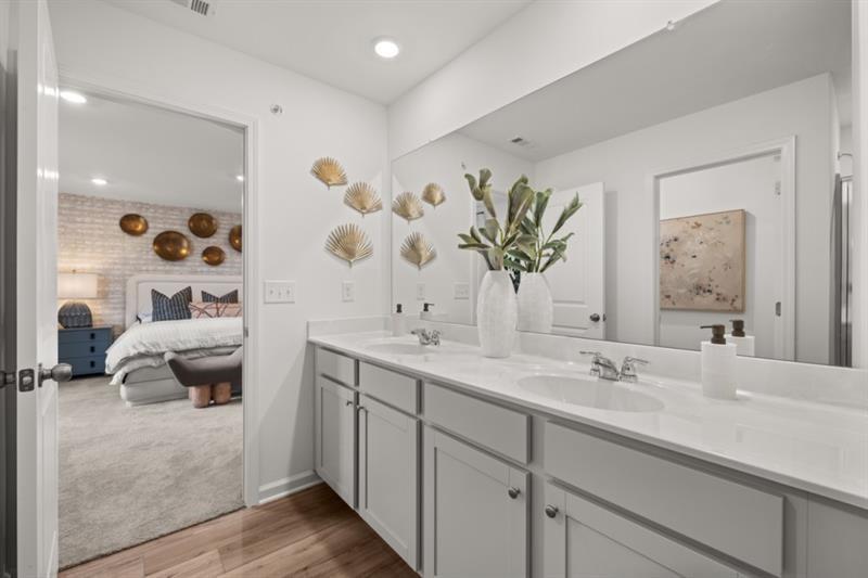 422 Red Dragon Drive Jefferson, GA 30549 - Photo 5 of 20 a en suite bathroom with double vanity sink and a mirror