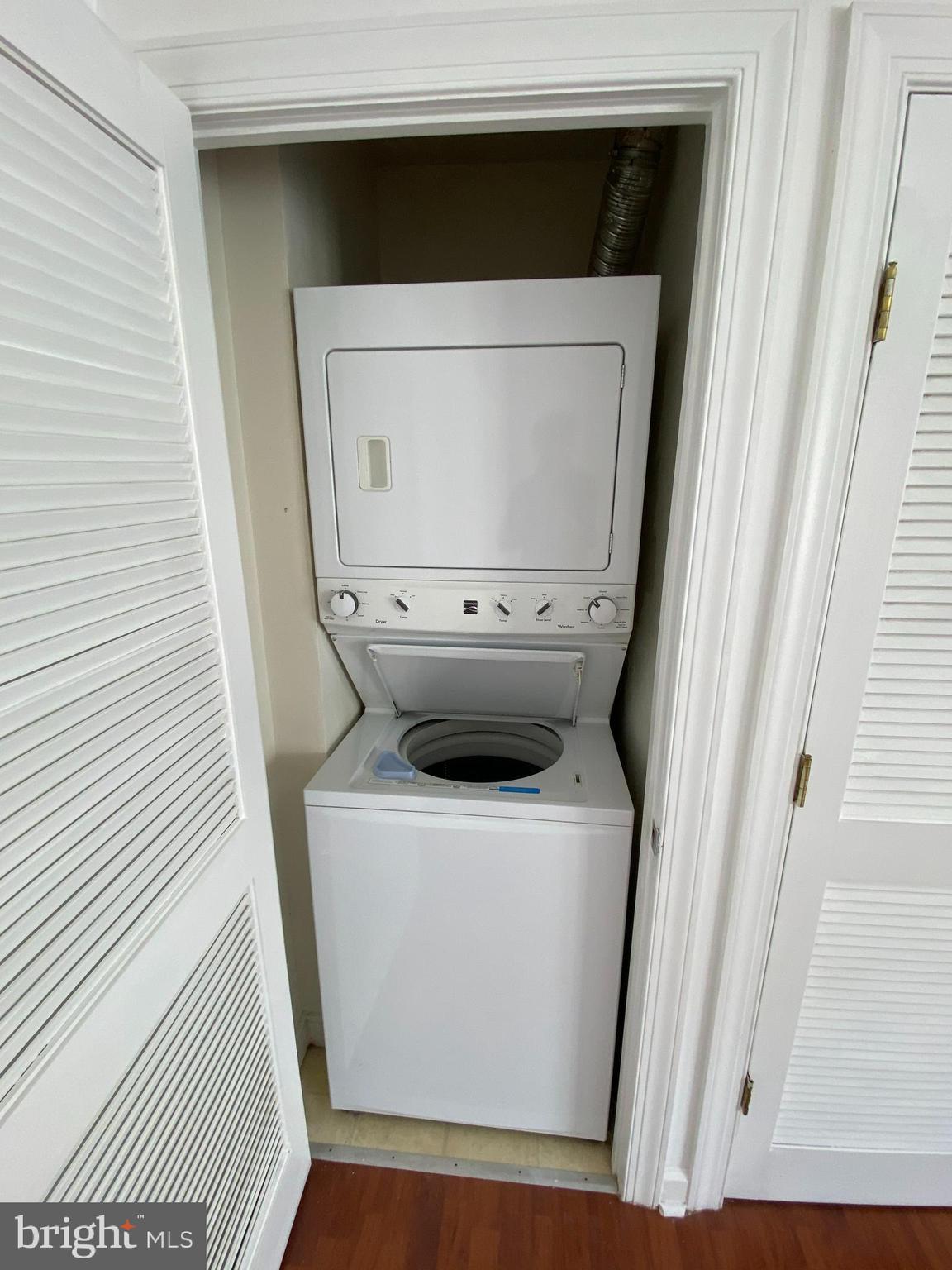 701 Brandywine Street Southeast, Unit 201 Washington, DC 20032 - Photo 17 of 18 a utility room with a washer and dryer