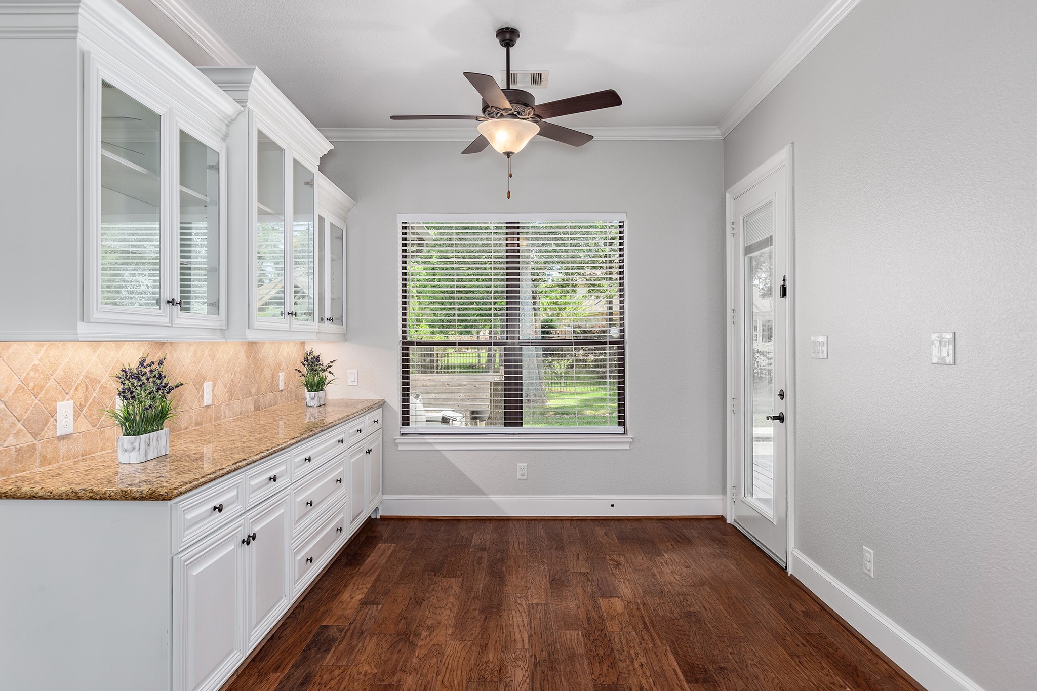 5507 Bright Timber Landing Drive Spring, TX 77386 - Photo 20 of 45 Breakfast area off kitchen contains plenty of built-in storage, perfect for a coffee bar!