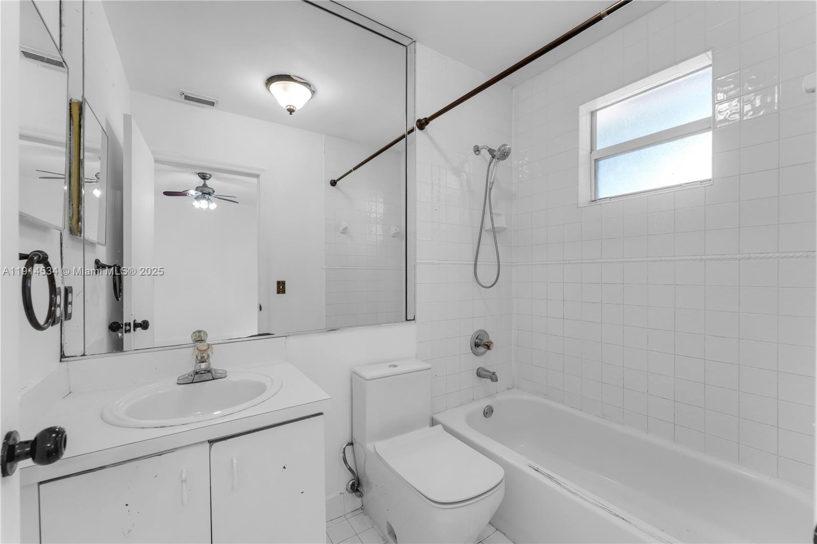 6350 Southwest 139th Avenue Miami, FL 33183 - Photo 14 of 37 a bathroom with a sink a toilet and shower