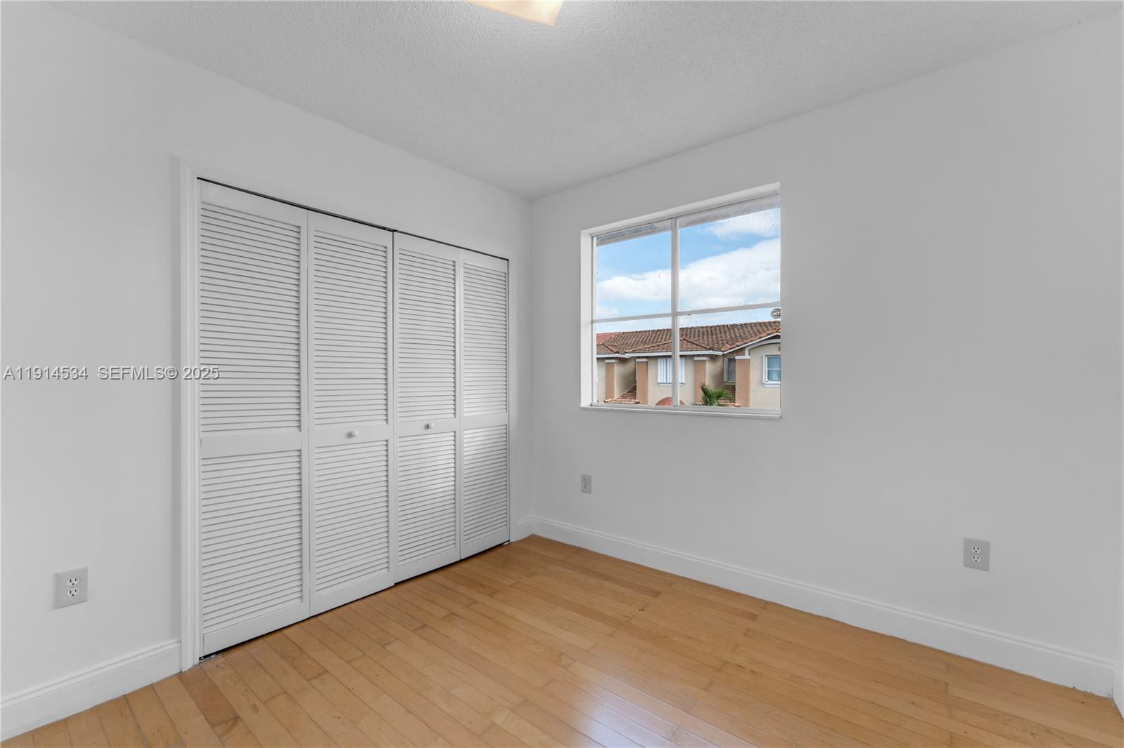 6350 Southwest 139th Avenue Miami, FL 33183 - Photo 21 of 37 wooden floor and window in a room