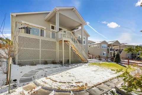 a view of a house with swimming pool