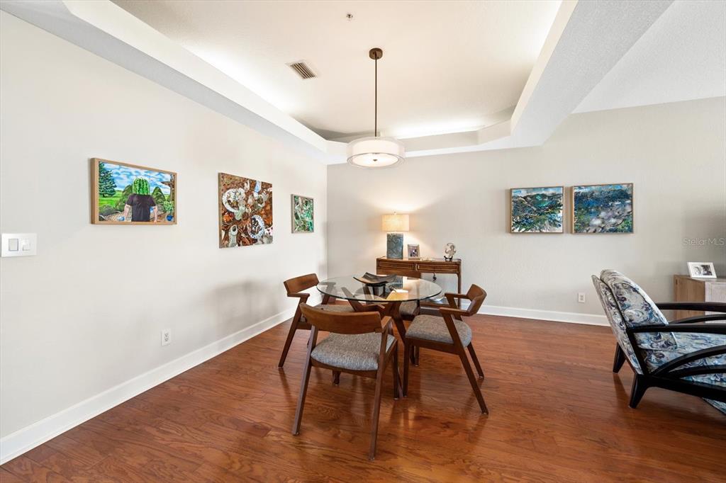 103 Shoals Circle North Redington Beach, FL 33708 - Photo 20 of 69 a view of a dining room with furniture window and wooden floor