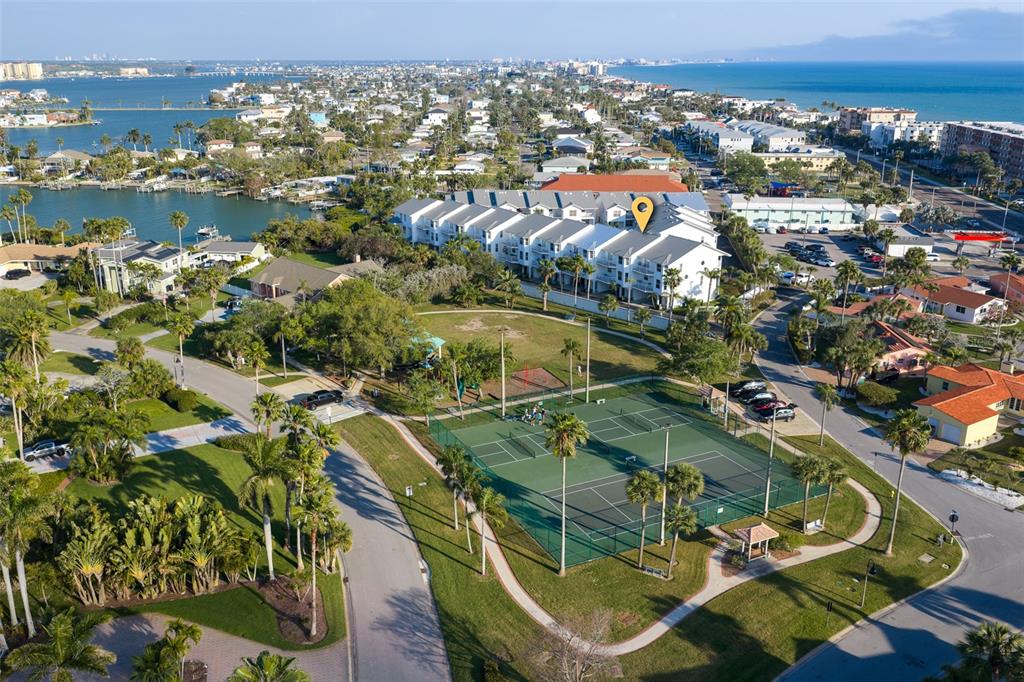 103 Shoals Circle North Redington Beach, FL 33708 - Photo 2 of 69 an aerial view of a residential houses with outdoor space