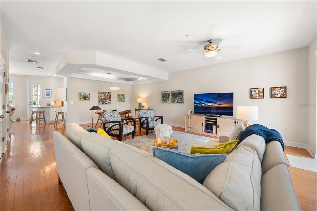 103 Shoals Circle North Redington Beach, FL 33708 - Photo 22 of 69 a living room with furniture and a flat screen tv