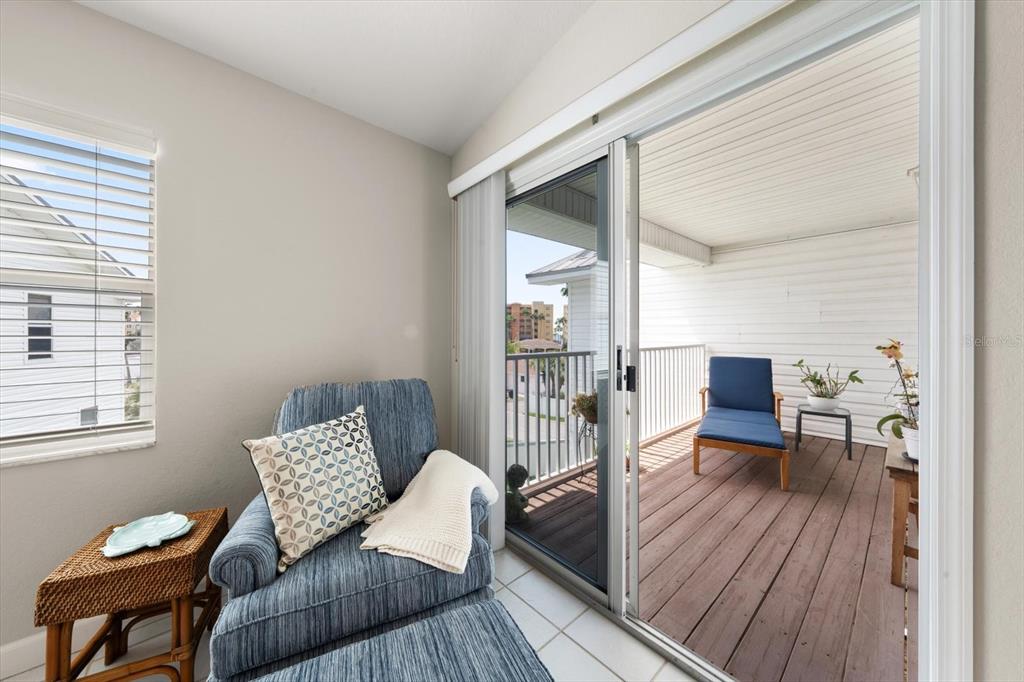103 Shoals Circle North Redington Beach, FL 33708 - Photo 31 of 69 a living room with furniture and a wooden floor