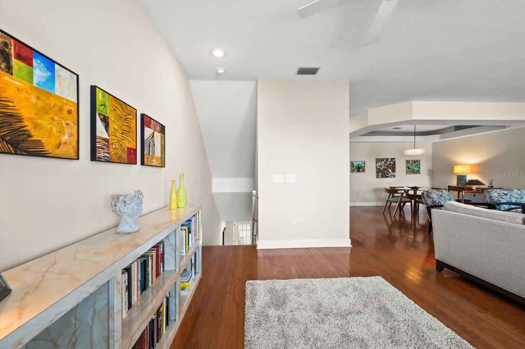 103 Shoals Circle North Redington Beach, FL 33708 - Photo 37 of 69 a living room with furniture and a table