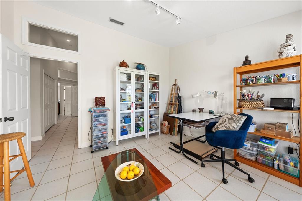 103 Shoals Circle North Redington Beach, FL 33708 - Photo 44 of 69 a living room with furniture and a table