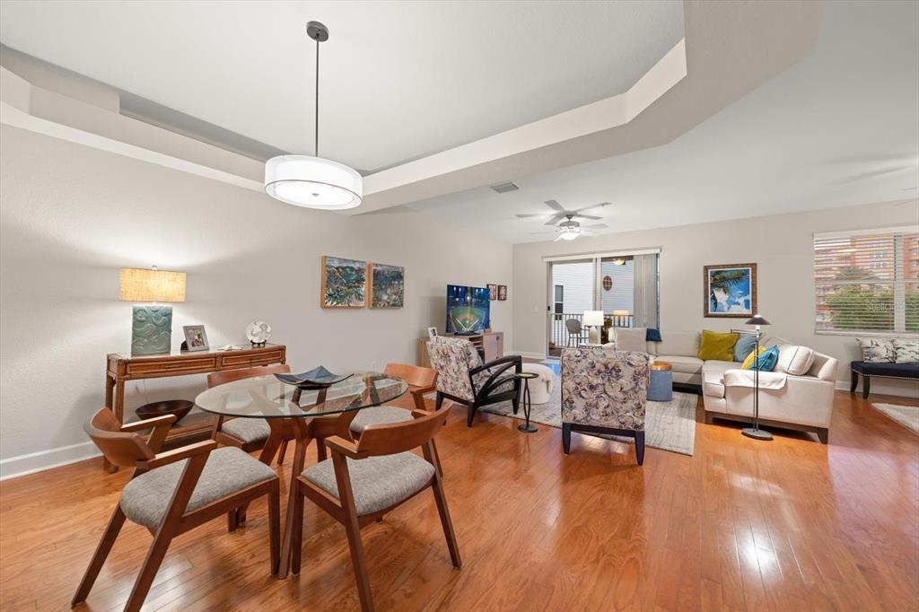 103 Shoals Circle North Redington Beach, FL 33708 - Photo 49 of 69 a living room with fireplace furniture and a wooden floor