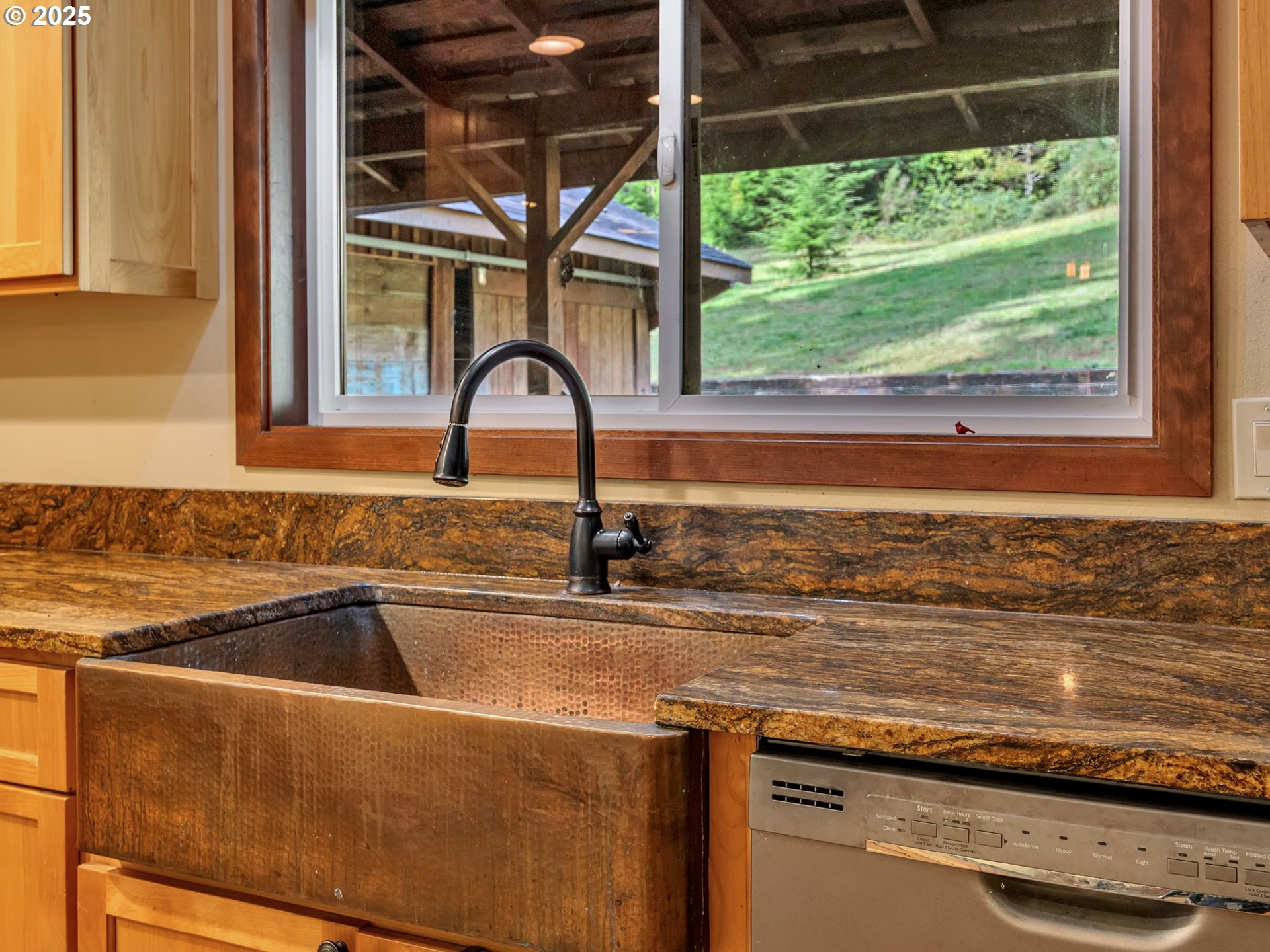 42274 Ziak-Gnat Creek Road Astoria, OR 97103 - Photo 16 of 48 a kitchen with a sink and large window