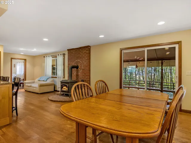 a room with gym equipment and large windows