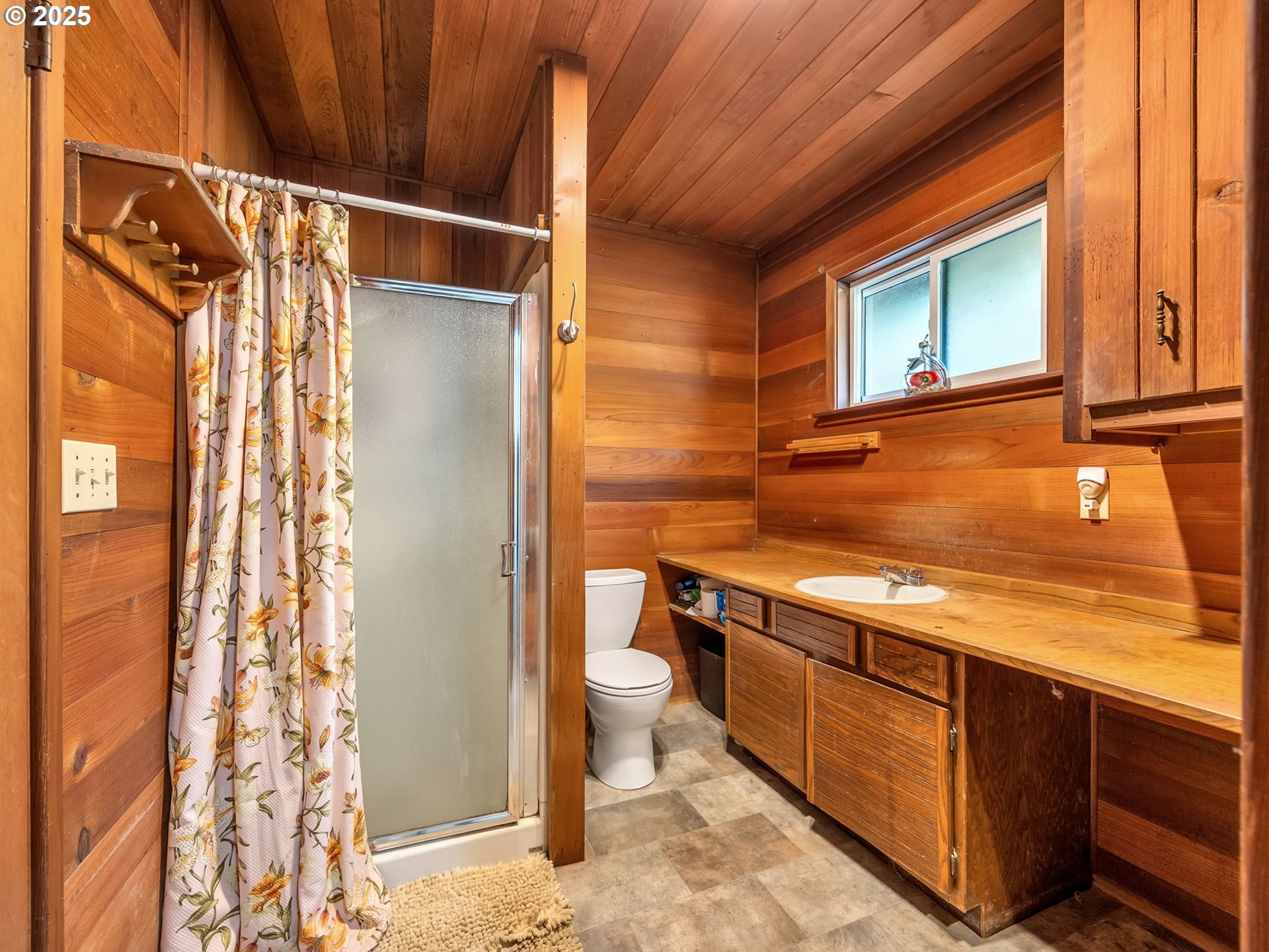 42274 Ziak-Gnat Creek Road Astoria, OR 97103 - Photo 32 of 48 a bathroom with a sink and a toilet