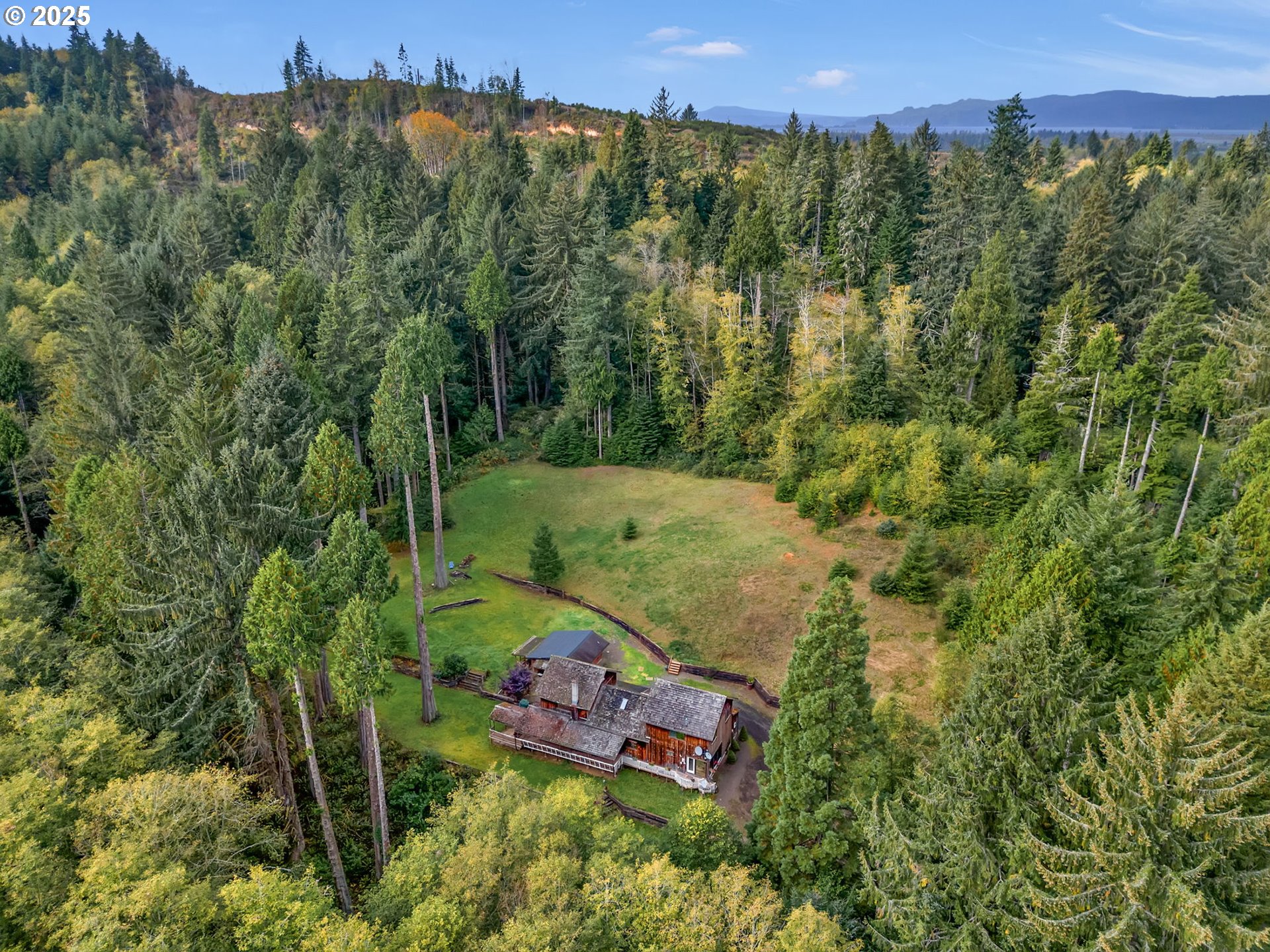 42274 Ziak-Gnat Creek Road Astoria, OR 97103 - Photo 45 of 48 an aerial view of a house with a yard