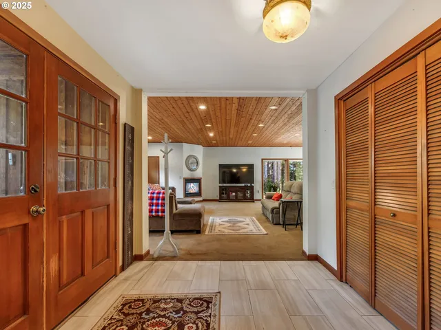 a very nice looking living room with a large window
