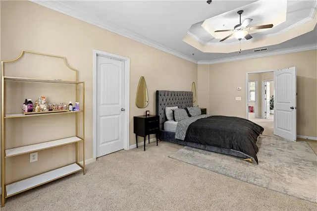 a bedroom with a bed and a walk in closet