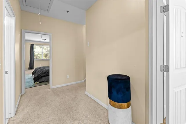 a bedroom with bed and a window