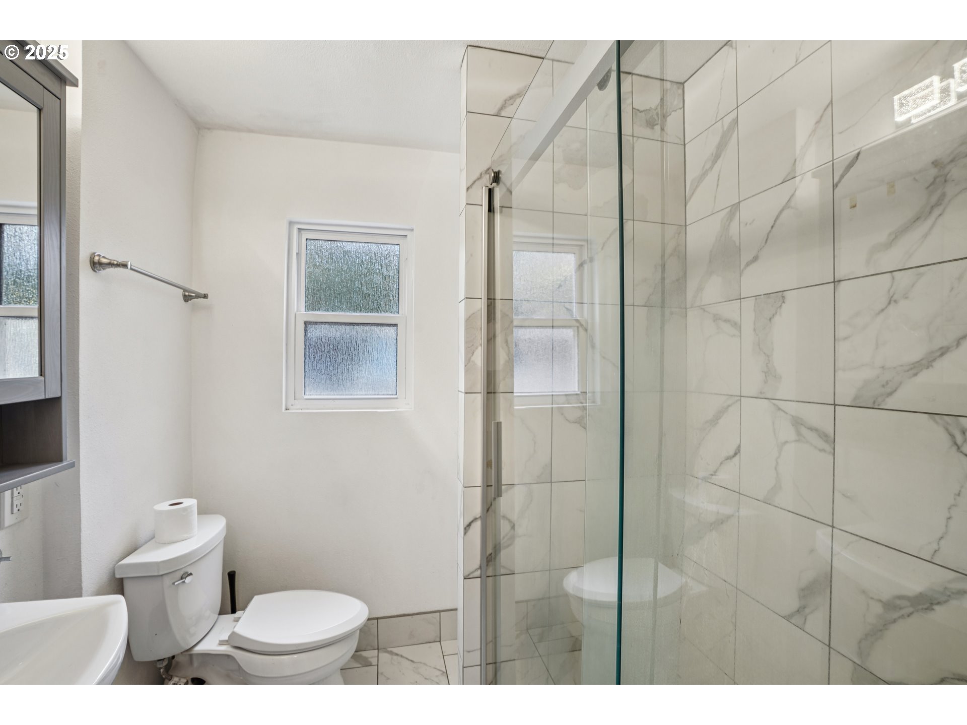 14806 Southeast Bush Street Portland, OR 97236 - Photo 11 of 33 a bathroom with a toilet and a shower