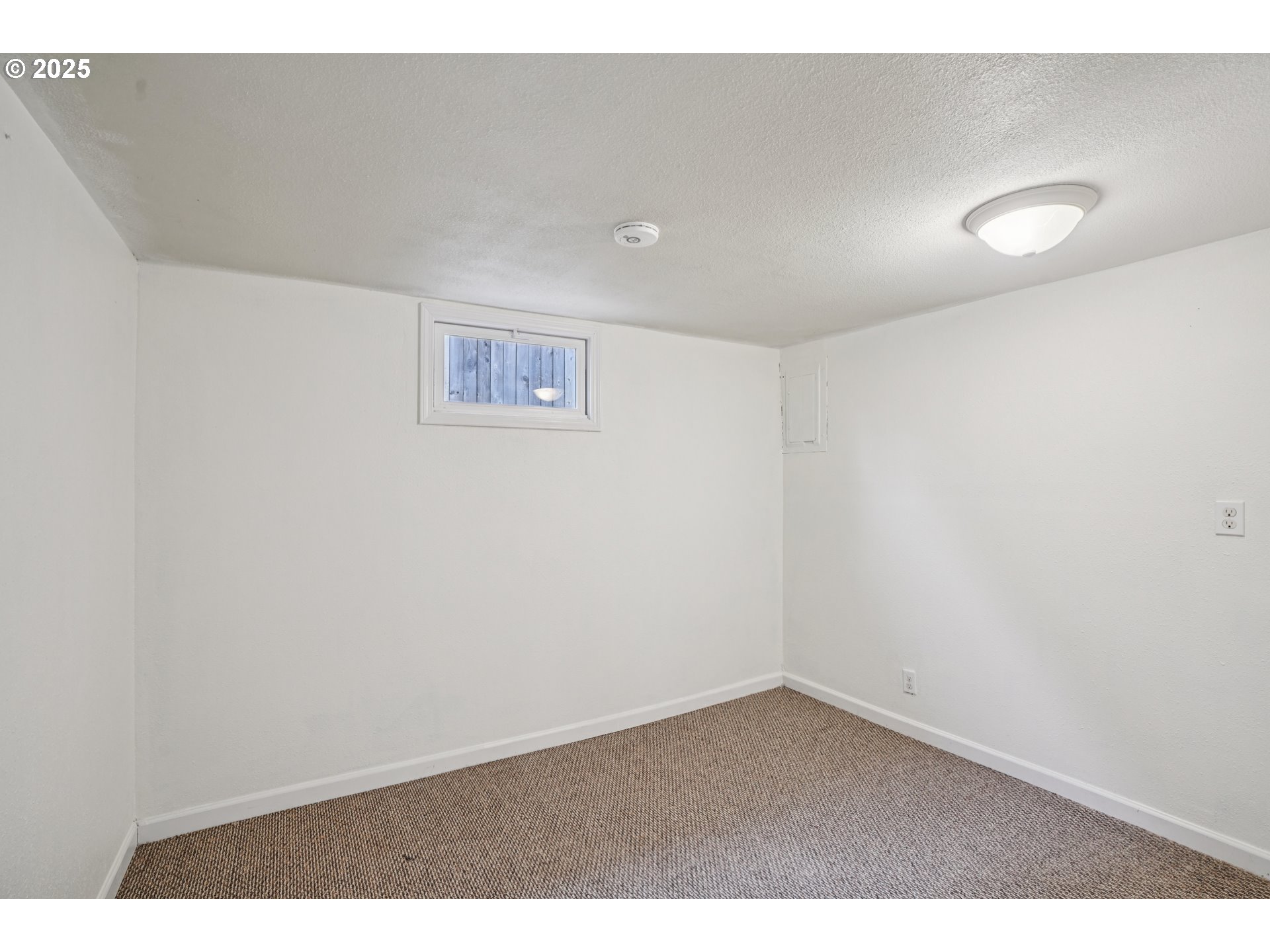 14806 Southeast Bush Street Portland, OR 97236 - Photo 22 of 33 a view of an empty room