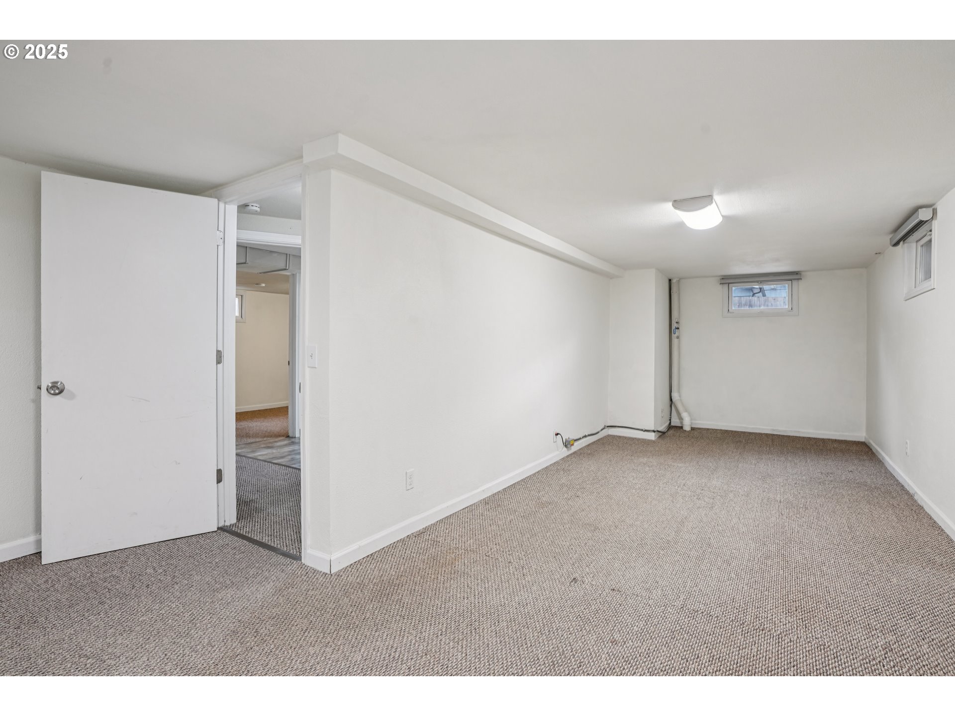 14806 Southeast Bush Street Portland, OR 97236 - Photo 24 of 33 a view of an empty room and closet area