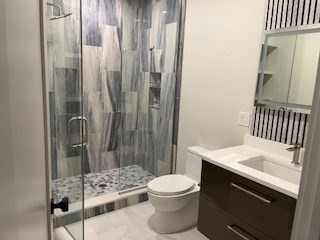 1574 Beacon Street, Unit U: PH2 Brookline, MA 02446 - Photo 6 of 11 a bathroom with a sink a toilet and shower
