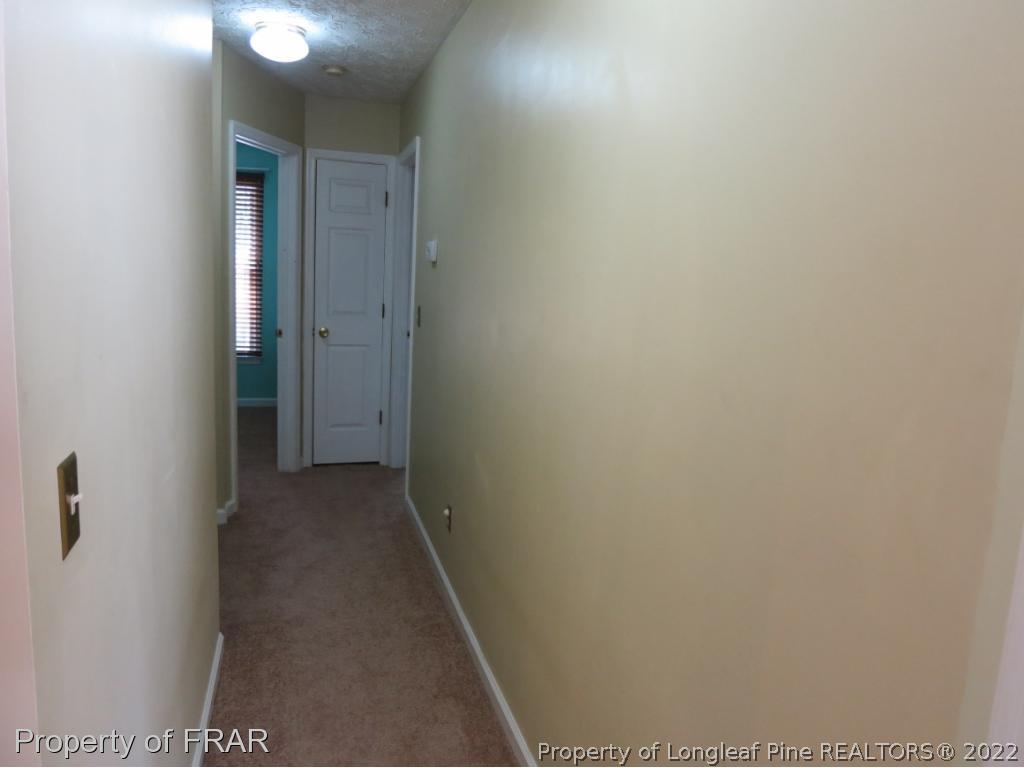 6875 Green Creek Road Fayetteville, NC 28314 - Photo 18 of 26 a view of a hallway