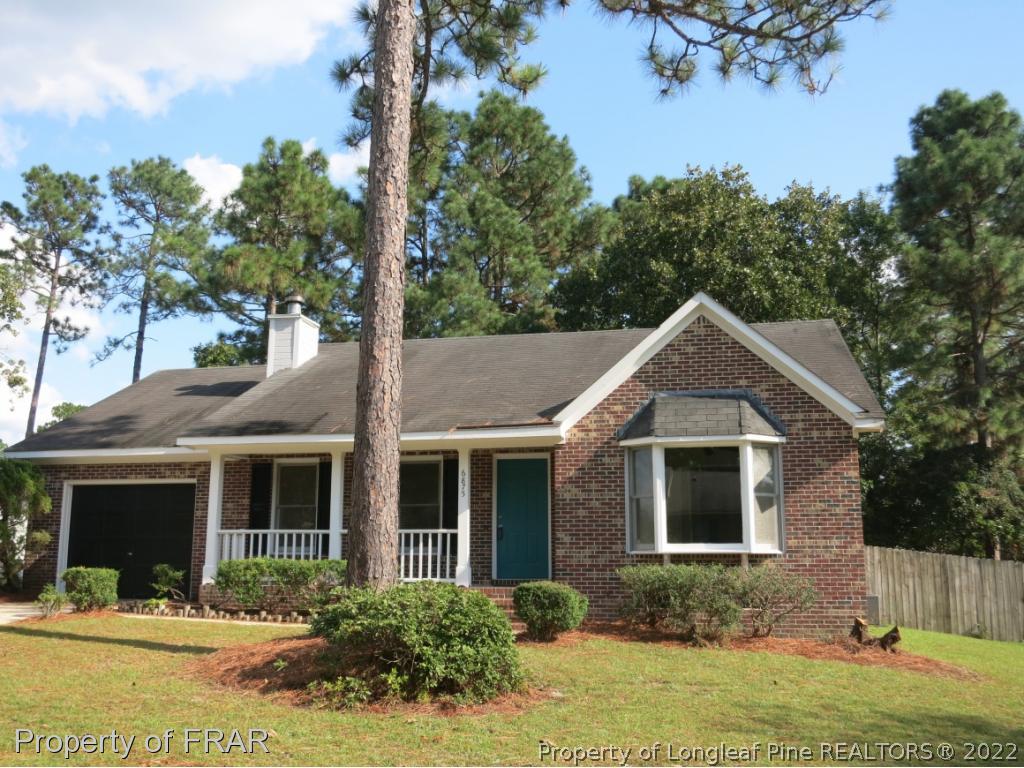 6875 Green Creek Road Fayetteville, NC 28314 - Photo 26 of 26 a front view of a house with garden