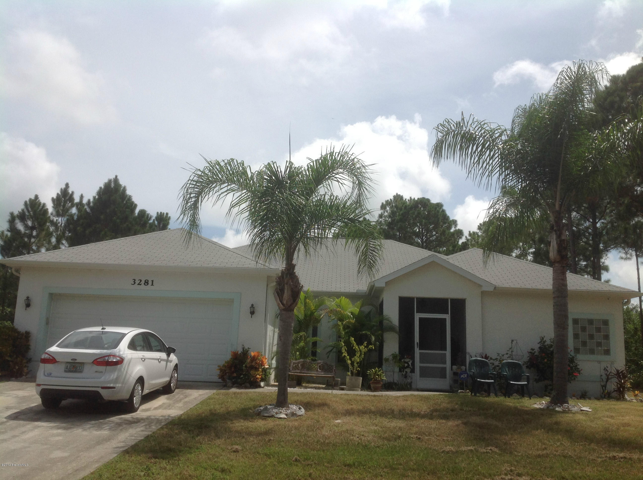 3281 Reef Road Southeast Palm Bay, FL 32909 - Photo 1 of 12 Front View