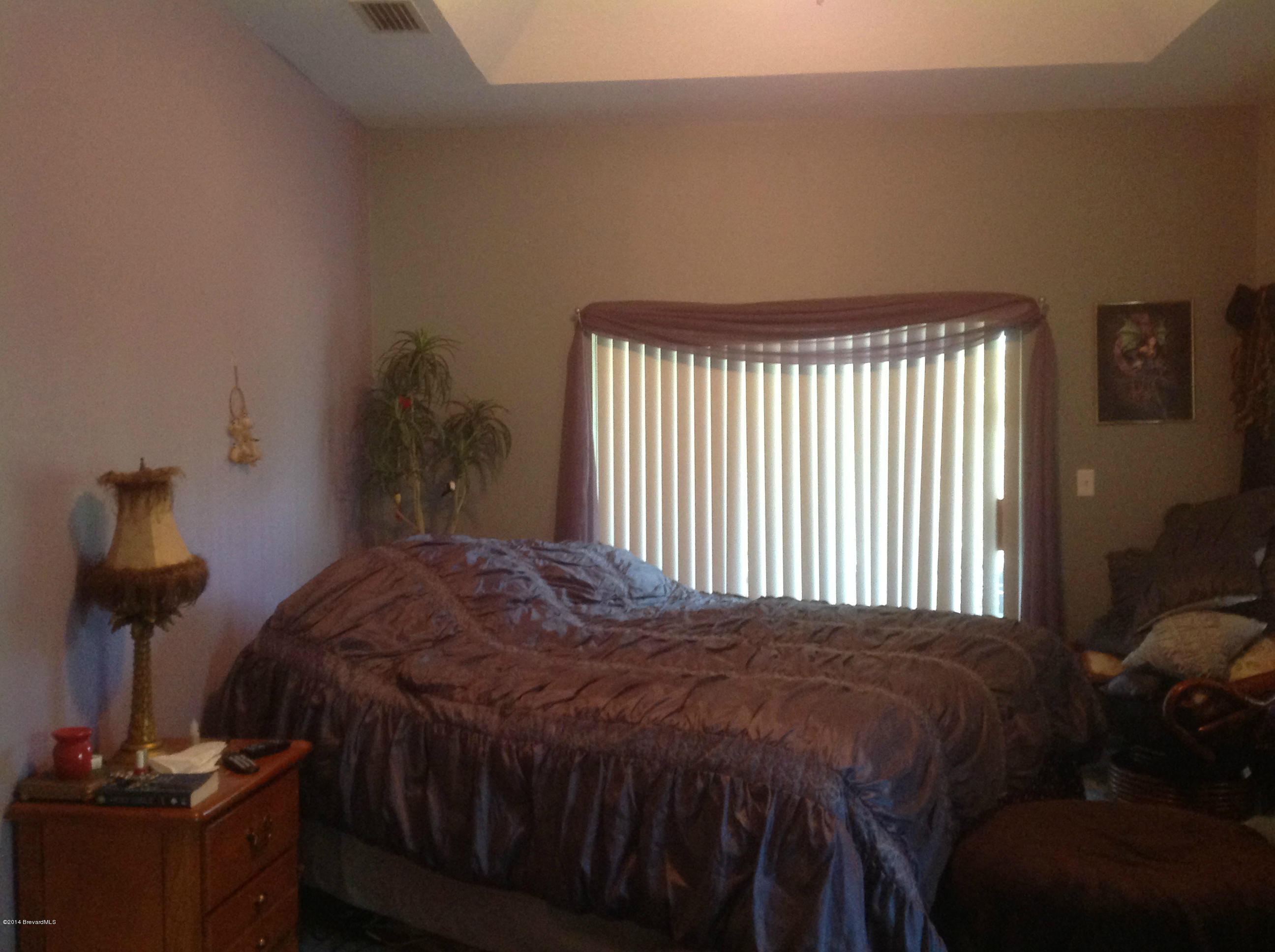 3281 Reef Road Southeast Palm Bay, FL 32909 - Photo 3 of 12 Master Bedroom