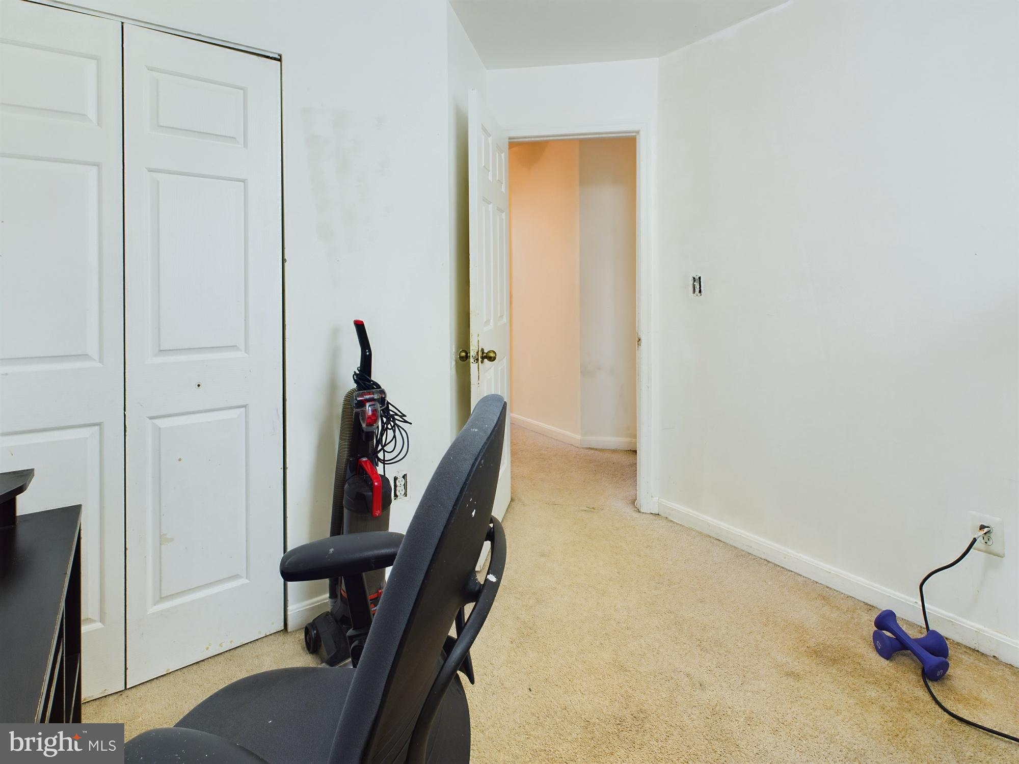 9620 Button Buck Circle Randallstown, MD 21133 - Photo 12 of 32 a view of a hallway with furniture and closet